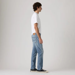 502™ Taper Men's Jeans - Here And There Distressed - Medium Wash
